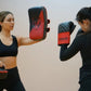 Image of women practicing during a lesson at Ultimate Martial Arts & Fitness Muay Thai and kickboxing gym in Mississauga, Ontario, Canada