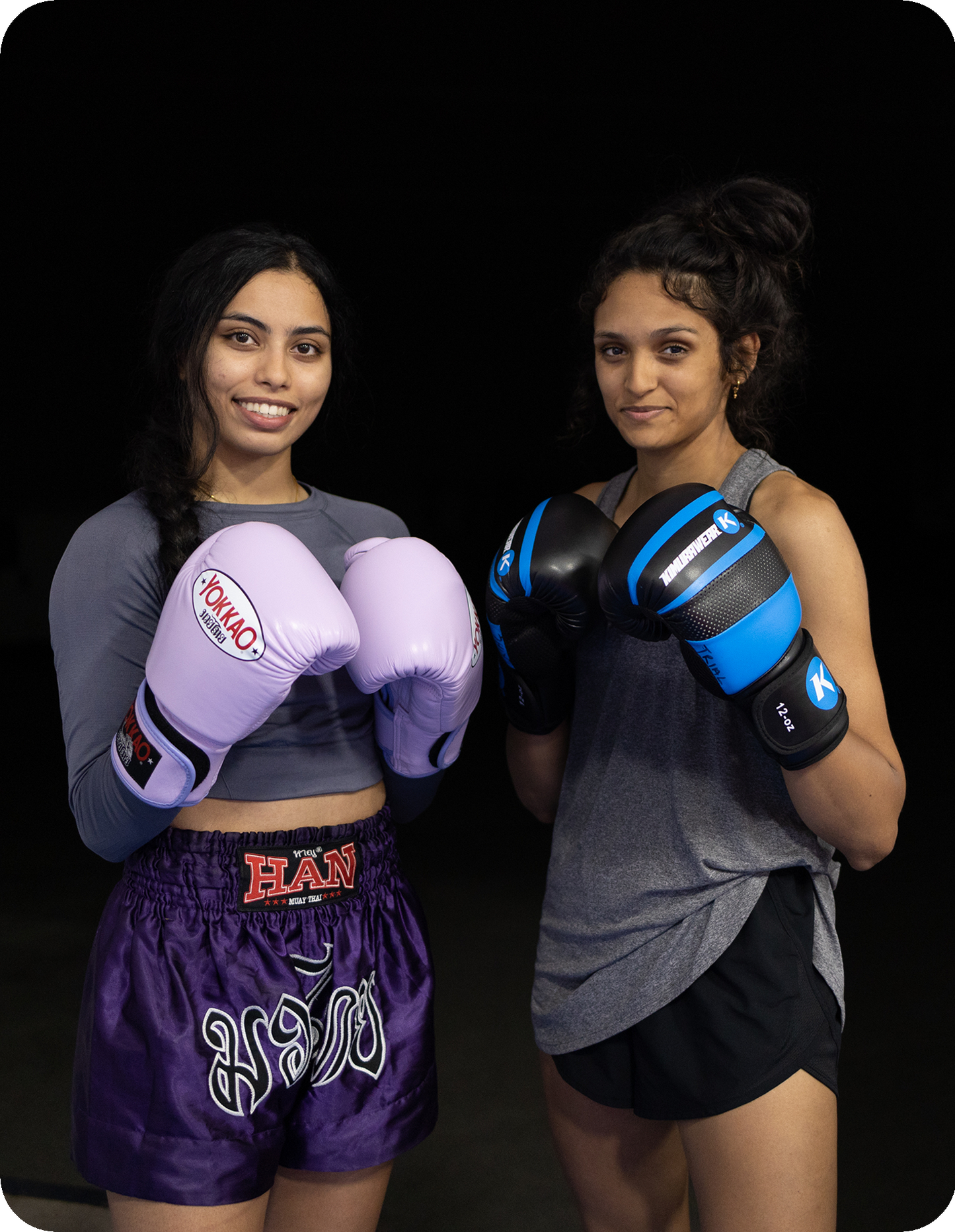 Image of two of our instructors for women's classes at Ultimate Martial Arts Muay Thai and kickboxing gym in Mississauga, Ontario, Canada